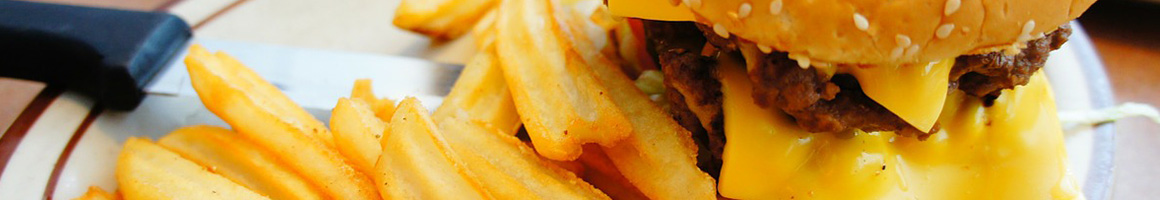 Eating American (Traditional) Burger Greek Salad at Tom & Jerry's Restaurant restaurant in Sycamore, IL.